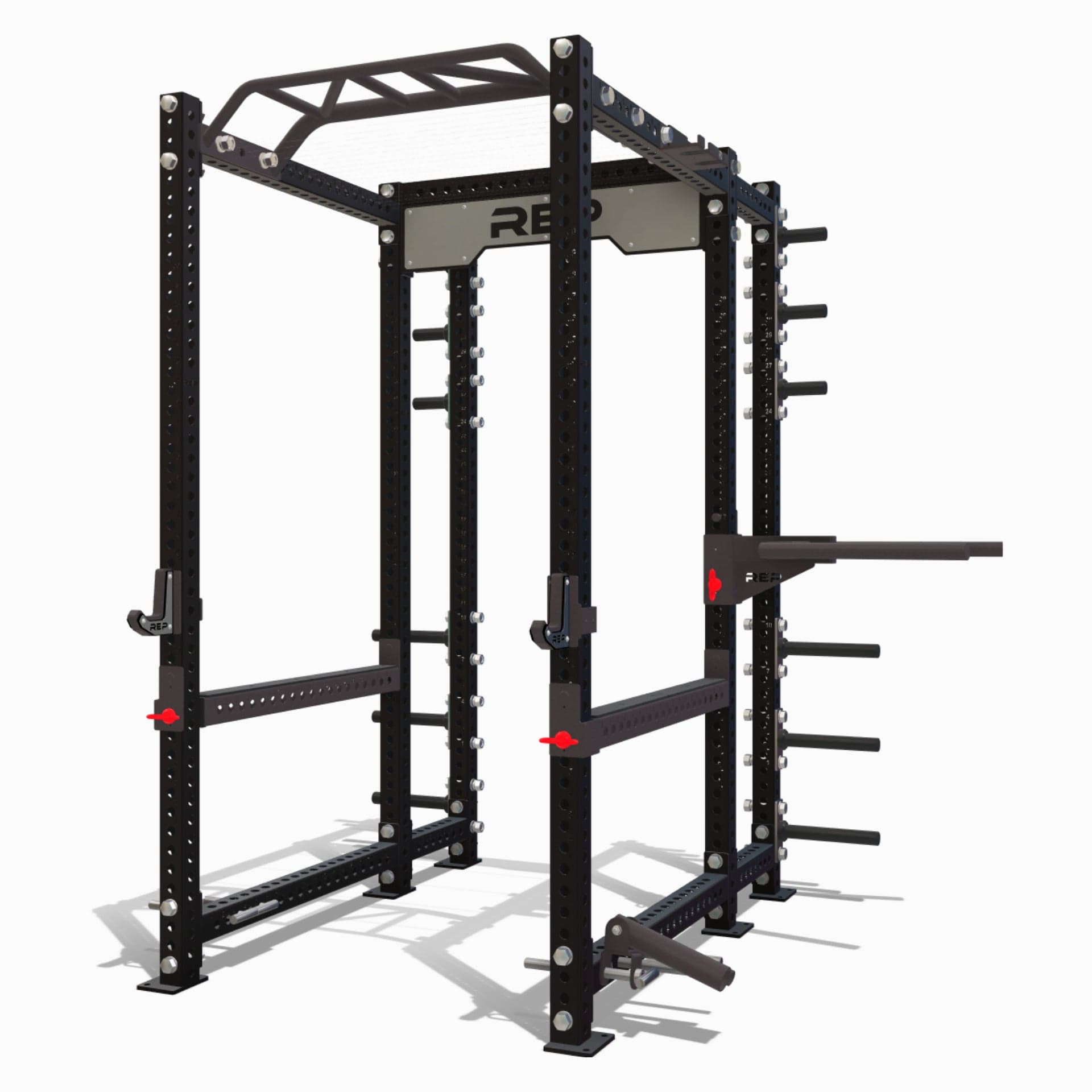 REP PR-5000 six-post power rack shown in a configured home-gym arrangement with storage and attachments
