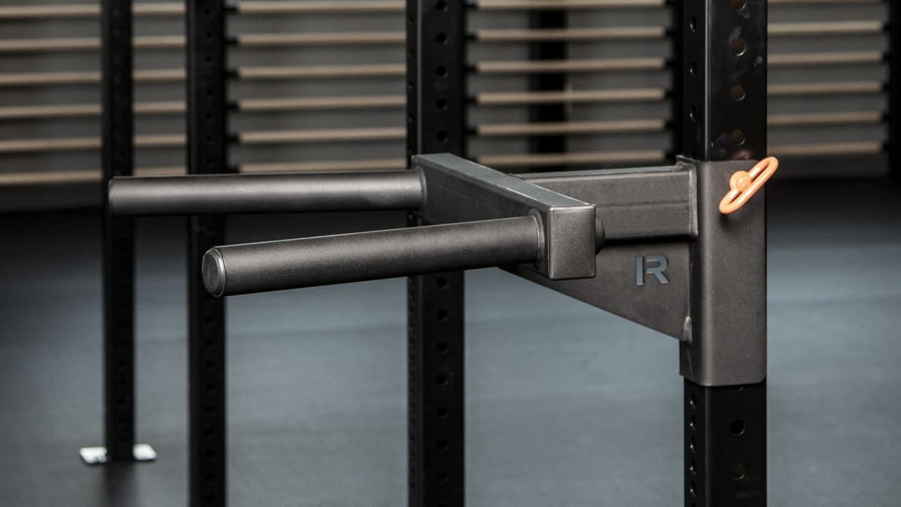 Rogue Monster Matador shown as a black dip attachment on a rack upright