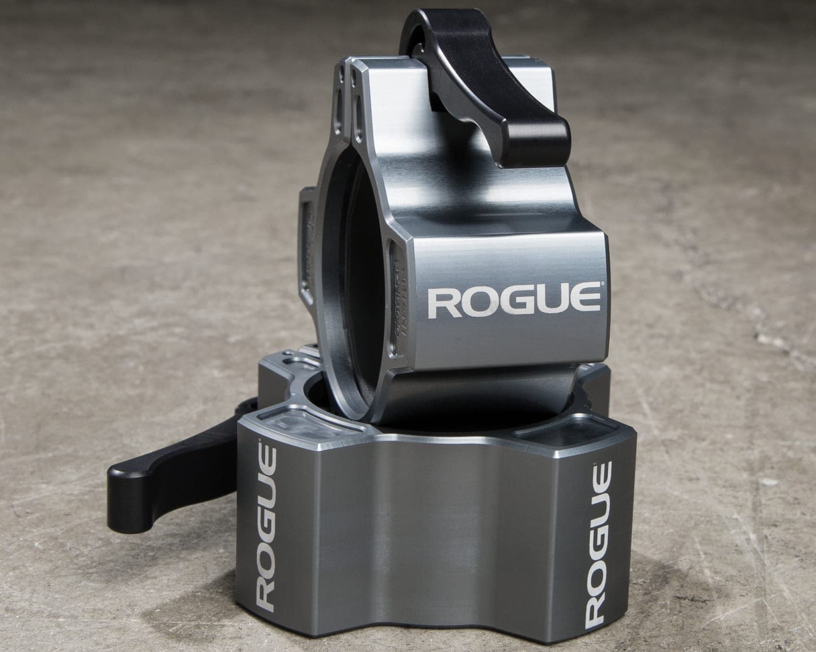 Rogue OSO Barbell Collars 2.0 shown as a pair of gunmetal clamp collars
