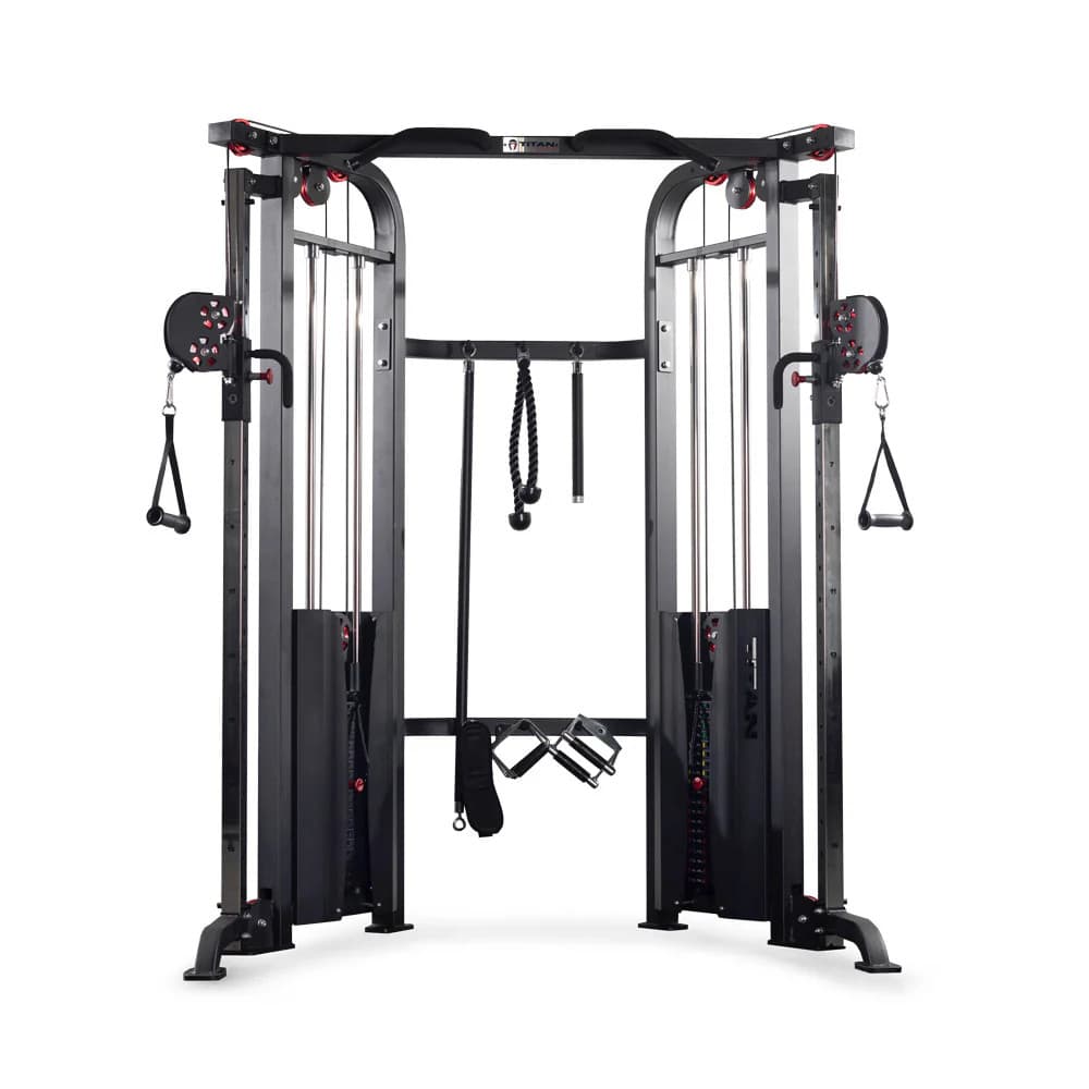 Titan Functional Trainer shown front-on with dual selectorized stacks, adjustable pulleys, and included cable attachments